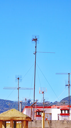 Antennas on the roof of a building in the town of Tenerifeの写真素材