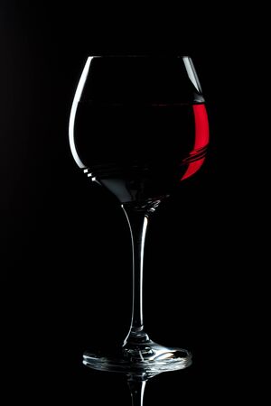 Red wine in structured glassの写真素材