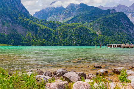 View over the crystal clear Koenigssee near Berchtesgaden in Tyrolの写真素材