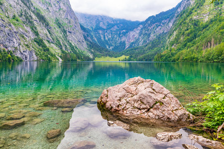 View over the clean and clear Obersee near Berchtesgaden in Tyrolの写真素材