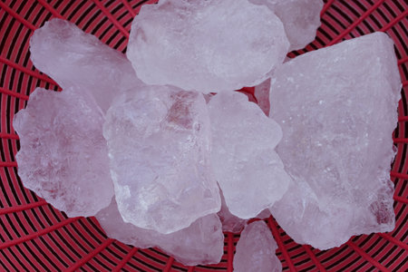 Crystal clear alum stones or Potassium alum on basket. Useful for beauty and spa treatment. Use to treat body odor under the armpits as deodorant and make water clear.の写真素材