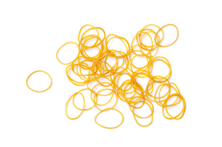 Brown rubber bands isolated on white background. Concept, equipment for fasten, tie general things, bind small objects together,made from natural para rubber. Sticky, flexibility,の写真素材