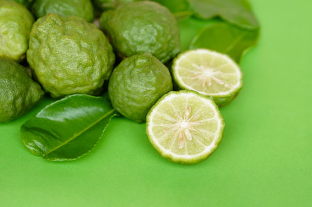 Bergamot fruits and leaves on  green background.  Concept, herbal fruits with sour taste, can be cooked as food seasoning and use for spa , aromaの写真素材