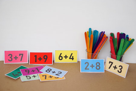 Colorful cards with numbers plus , addition on cards and colorful sticks for counting for kids....