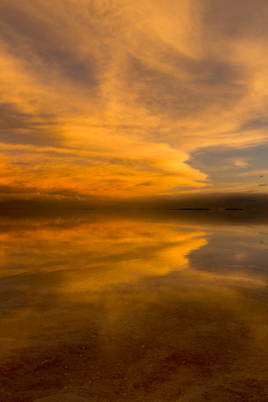 Sunset view of the salar de Uyuni Salt Lakeの写真素材