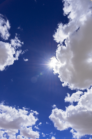 White clouds of the salar de Uyuni Salt Lakeの写真素材