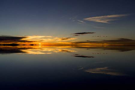 Sunset view of the salar de Uyuni Salt Lakeの写真素材