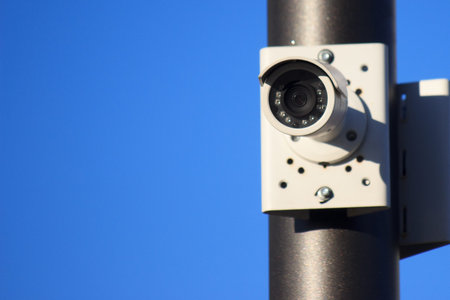 Modern technologies in video surveillance. Outdoor surveillance camera with Wi-Fi transmitter white,...