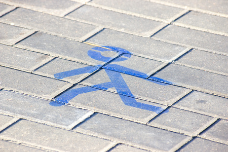 the figure of a man on pavement. traffic regulations. safe pedestrian crossing. path for people, convenient cityの写真素材