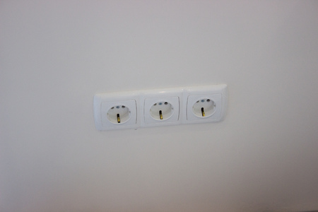 repair, installation of sockets in wall. finishing work in the finish. building materialの写真素材