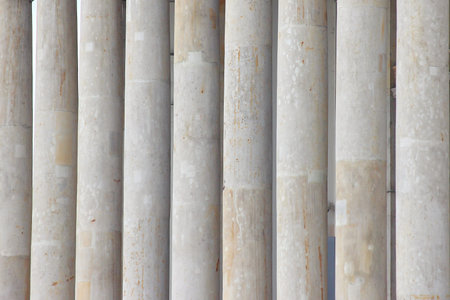 columns of marble, the background of the columns. the structure of the stone monolith. smudges from...