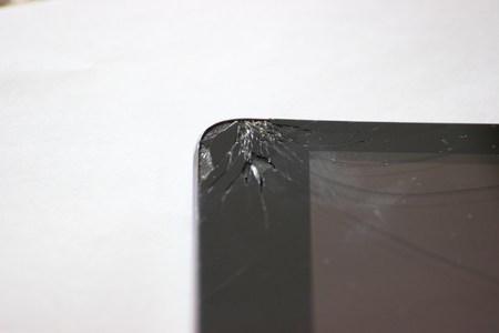 broken screen of mobile phone or tablet. modern technologies in human life. to repair the equipment, replace broken partsの写真素材