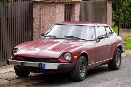 Poland, Krakow - October 4, 2019: Datsun 280Z dark cherry color, japanese oldtimer car lot in a...