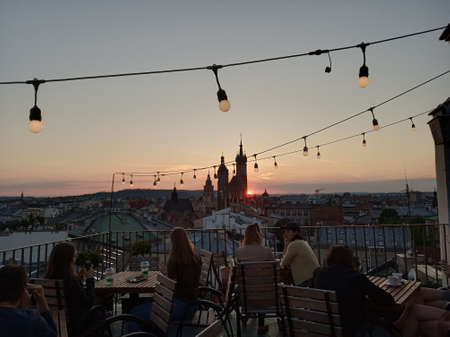 Krakow, Poland 20.09.2019: View of European city from a high point, bright different clouds against the blue sky.のeditorial素材