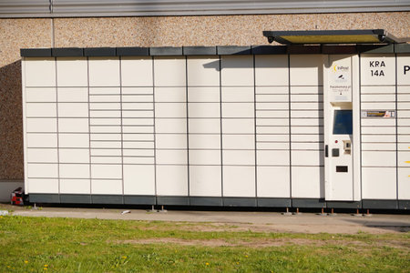 Krakow, Poland 20.04.2020: Boxes for parcels and letters on the street, automatic machine for...