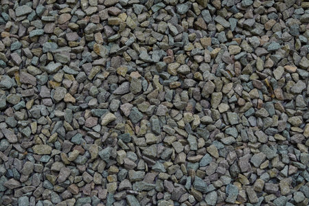 Stone wall, large gray stones, civil and industrial construction.