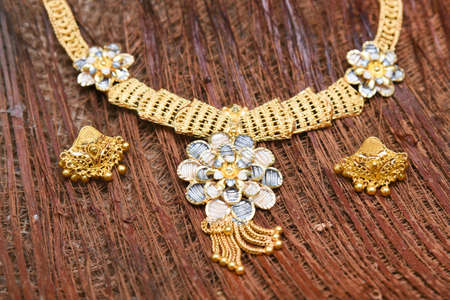 Gold Necklace, jewellery or jewelry of Indian bride female wear traditional handicraft or handmade decorative antique gold woman on wedding, festivals in Kerala, South and North India.の写真素材