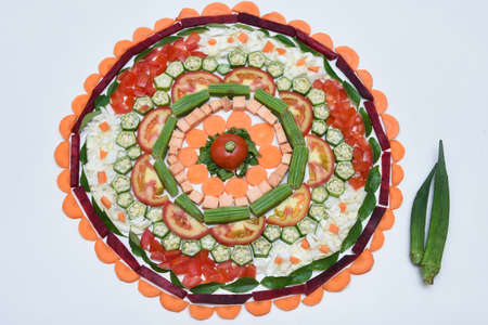Kerala harvest festival Onam celebration, Kerala South India. Pookalam or flowerbed, Special vegetarian food made with fresh cut vegetables. flower carpet, flower bedの写真素材