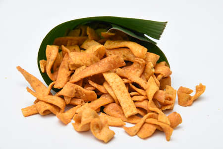 Kerala snack Pakkavada or ribbon Pakoda fried snack popular in South India Tamil Nadu, Top view Indian tea time food fried in coconut oil.の写真素材