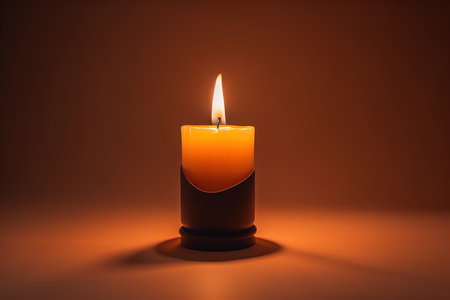 Creative burning candle on a wooden background. ai generativeの素材