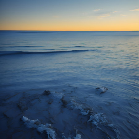 beautiful sunset over the sea in winter. long exposure photo. generative aiの素材