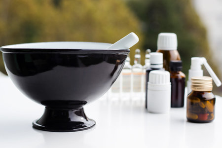 Alternative Medicine. Mortar and pestle with pills and pill bottles