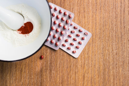 Herbs powder in the mortar and pestleの写真素材