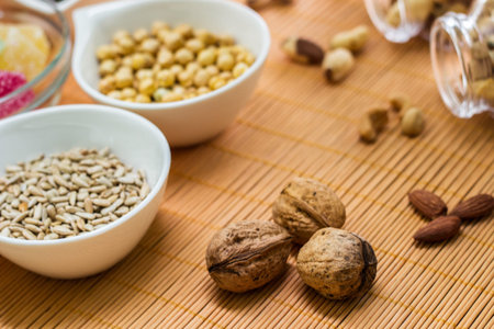 Dried fruits and nuts in the bowl. Assortment of candied fruitsの写真素材