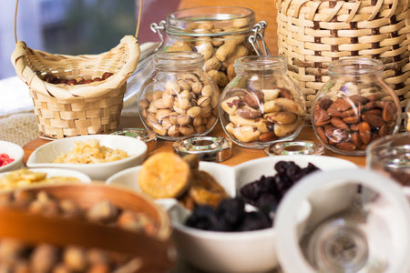Dried fruits and nuts in the bowlの写真素材