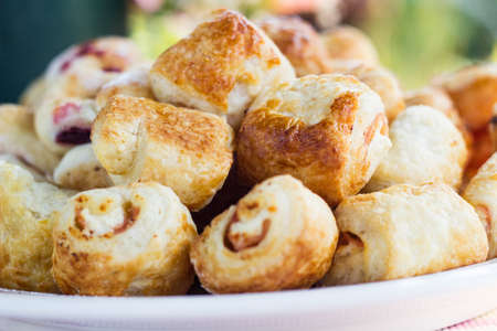 Tasty rolls with cheese and hamの写真素材