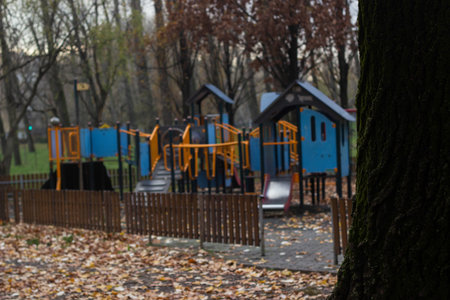 Defocused and blur image of children's playground at public park for background usageの写真素材