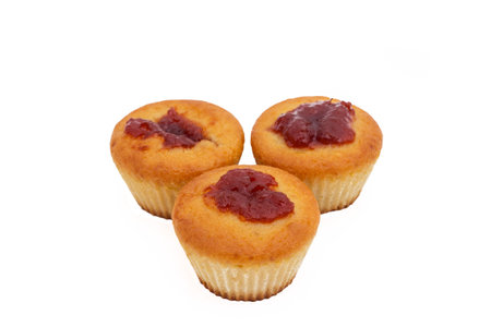 Sweet apricot Muffins, isolated on whiteの写真素材