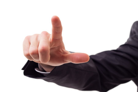 Businessman touching virtual screen. Isolated on white