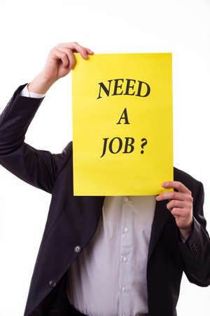 Torso of Man Holding "Need a job"の写真素材