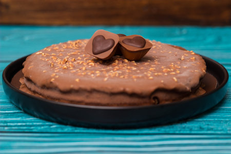 Delicious chocolate layer cake with toffee heart