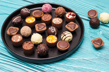 Variation of chocolate candies on a plate
