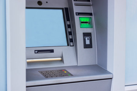 Modern street ATM machine for withdrawal of money and other financial transactionsの写真素材