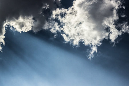 Beautiful sky with white clouds background. Light cumulus clouds in the blue sky. Wide photo.