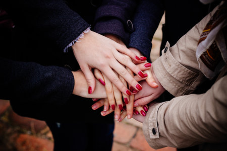 Group with hands together, friendshipの写真素材