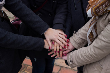 Group with hands together, friendshipの写真素材