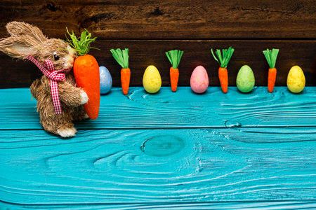Easter Bunny and Eggs on wooden tableの写真素材