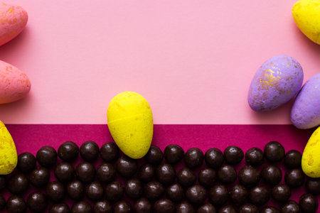 Chocolate and Easter Eggs on color Background. Happy Easterの写真素材