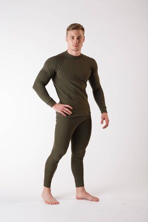 The guy in thermal underwear on a white background. Sportswear.の写真素材