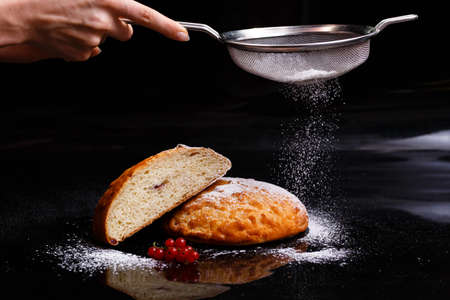 Sweet cupcake in round bread shape with filling. Photo in section.の写真素材
