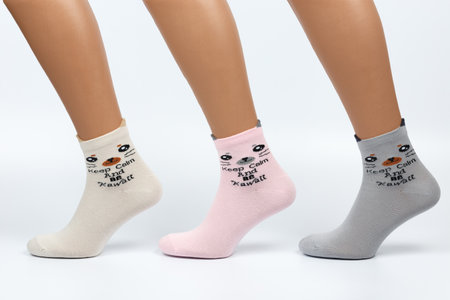 Socks on a white background. Socks on the leg.の写真素材