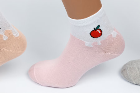 Socks on a white background. Socks on the leg.の写真素材