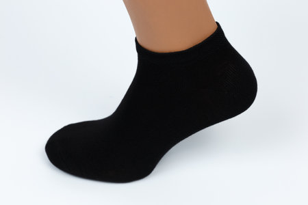 Socks on a white background. Socks on the leg.の写真素材