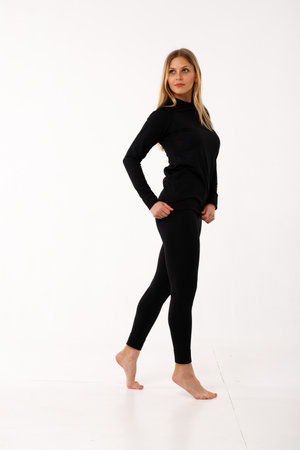 Sporty blonde girl in thermal clothing for womenの写真素材