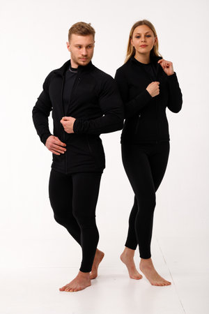 Sports family, husband and wife in thermal clothes.の写真素材