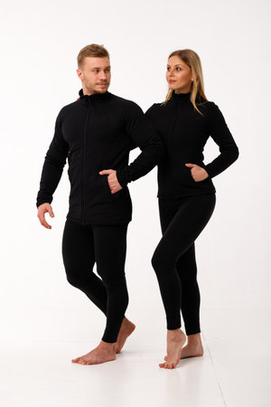 Sports family, husband and wife in thermal clothes.の写真素材